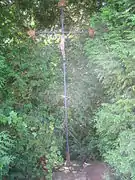 Calvaire situé sur le bord de la D 90.