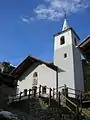 L'église paroissiale Saint-François, dans le hameau de La Ville (en patois, Veulla).