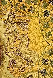Christ avec une auréole et les attributs de Sol Invictus : chevaux cabrés. Mosaïque de la nécropole sous la basilique Saint-Pierre de Rome, IIIe-IVe siècle apr. J.-C.