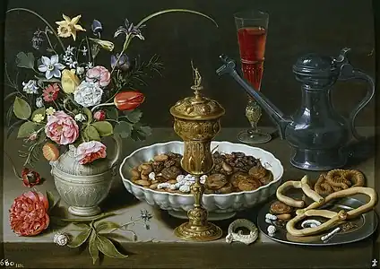 Nature morte aux noix, friandises et fleurs, 1611.