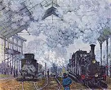 Locomotive émergeant de la fumée qui noie les immeubles du fond