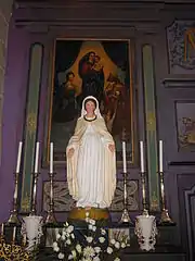 Retable, partie gauche, peinture de la Vierge à l'Enfant.