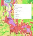 Carte de l'occupation des sols au sein de la cluse et des alentours. Comme on peut le voir, le fond plat de la cluse est très largement occupé par les habitations (en rouge) et les zones industrielles et commerciales (en violet).