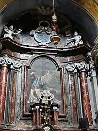 Retable d'une chapelle latérale.