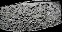 bas-relief rectangulaire convexe, représentant une mêlée de soldats à pied et à cheval.