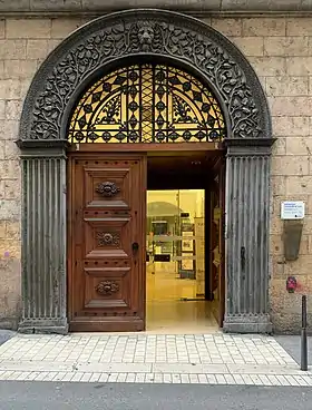 Porte de l'ancienne Condition des soies, située au no 7 de la rue, en 2019.