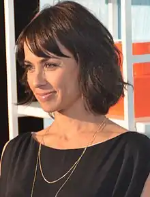 Constance Zimmer dans le rôle de Janine Skorsky