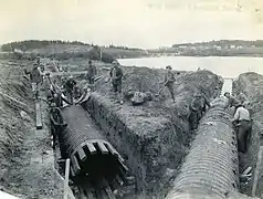 Construction d'un réseau d'égout à la Price Brothers and Company à Riverbend, Alma, au Québec