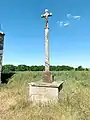 Croix datant de 1895, située près de la chapelle Sainte-Eugénie à Corseul.