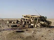 Un Cougar disposant d'une coque en V touché par un engins explosifs improvisés en Irak.