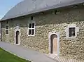 Façade de l'ancienne Cour de Justice de Hosdent du XVIIe siècle, rénovée en 2007.