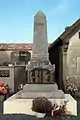 Le monument aux morts dans le cimetière devant l'église (mars 2012)