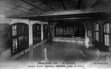  Le Cours Desir, rue Jacob, victime de la crue de 1910. Vue de la salle des fêtes