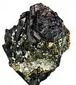 Covellite, habitus hexagonal en feuillets (avec de la pyrite)