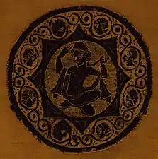 Aphrodite accroupie. Broderie en lin et laine. Égypte copte, IIIe – IVe siècle.