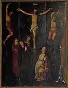 Un tableau du Christ en croix.