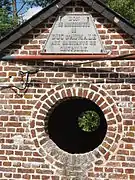 Plaquette du lavoir, commémorant le duc d'Aumale.