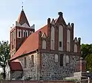 Dębowa Łąka, pow. de Wąbrzeźno, pays de Chełmno, Pologne – style relevant de la brique mais avec beaucoup de pierre