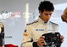 Photographie de Daniel Ricciardo au Grand Prix automobile de Grande-Bretagne 2011