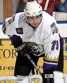 Photographie couleur d'un joueur de hockey sur glace