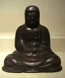 Daruma Daishi Bodhidharma.