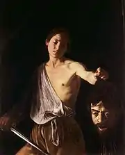 Tableau montrant un jeune homme tenant une épée d'une main et de l'autre la tête coupée d'un géant.
