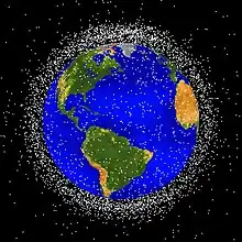 Image de la Terre et de la répartition des débris spatiaux autour en orbite basse.