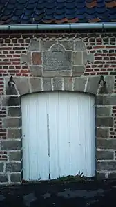 Pierre posée sur l'église par Louis Payen et Rosalie Jacquart.