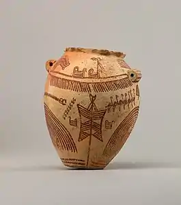 Vase funéraire : bateau, oiseaux et vêtement (peau) à couvrir le mort, tendu sur des perches.Metropolitan Museum of Art