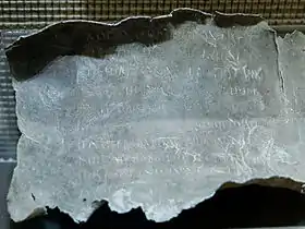 Exemple d'une tablette de plomb munie d'inscriptions