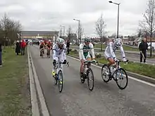 Photographie présentant Evaldas Šiškevičius (au centre) au Grand Prix de Denain 2013.