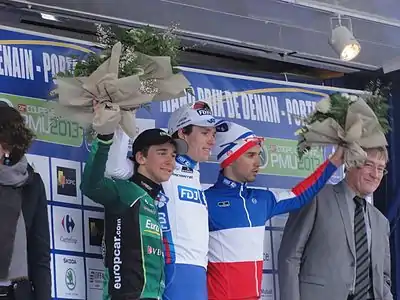 Photographie présentant Bryan Coquard sur le podium du Grand prix de Denain.