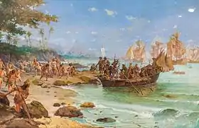 A painting depicting a boat containing armored men being rowed from ships on the horizon onto a shoreline crowded with people in loincloths, while in the background a native kneels before a small group of European men with a large white banner bearing a black cross