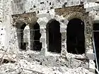 Façade d'un mur ancien bombardé pendant le siège de Homs (photo 5 avril 2012)