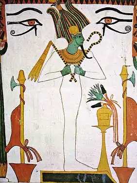 Osiris debout entouré par deux nébrides. Tombe de Sennedjem, XIXe dynastie.