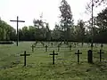 Vue d'ensemble avec la grande croix du cimetière
