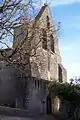 Le clocher-mur et le porche de l'église (mars 2012)