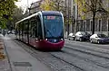 tramway passant devant le groupe scolaire Trémouille
