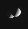 Occultation de Rhéa par Dioné observée par la sonde spatiale Cassini.
