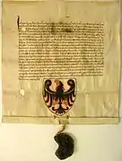 Le document avec lequel Jean 1er de Bohême a accordé à Nicolò da Bruna l'utilisation de l'aigle Saint Venceslao pour les armoiries de la principauté épiscopale de Trente le 9 août 1339.