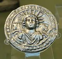 Disque d'argent dédié à Sol Invictus, IIIe siècle.