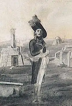 Gravure en noir et blanc : homme en pied, en uniforme impérial au milieu de ruines antiques