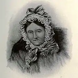 Portrait en buste d'une femme âgée en bonnet de nuit de dentelle.