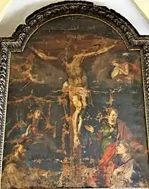 Crucifixion de Jésus entre la Vierge Marie et saint Jean avec deux capucins en adorant.