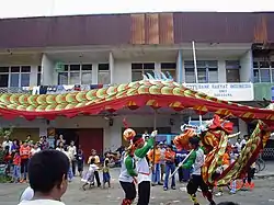 Scène traditionnelle chinoise à Kalimantan.