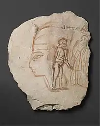 Pharaon, un égyptien ordinaire et une étrangère. Ostracon. Éclat de calcaire. H. 26 cmMet