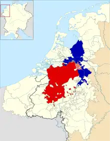 Carte du duché de Brabant en jaune clair, avec des zones rouges et bleu