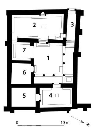 Plan montrant la disposition de pièces dans un immeuble de forme rectangulaire.