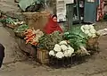 Vendeuse de légumes au Darbâr.