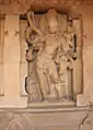 Shiva, niche centrale face Sud, face externe du mur entourant le déambulatoire. Cette position correspond symétriquement sur la face Sud à celle de Durga, sur la face Nord
